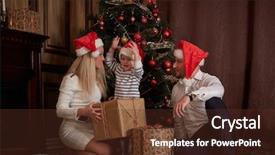  Presentation with family tree - Cool new PPT theme with happy family with gifts sitting near christmas tree at home merry christmas and happy new year backdrop and a tawny brown colored foreground