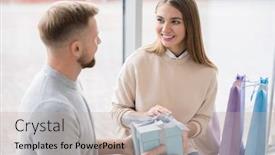  Presentation with mall - Presentation theme featuring happy female passing giftbox to her husband or boyfriend after shopping while resting in the mall and talking background and a mint green colored foreground