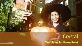  Presentation with black jack - Beautiful presentation featuring happy girl in hat and black attire holding jack-o-lantern and looking at camera backdrop and a tawny brown colored foreground
