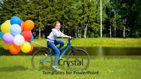  Presentation with happy birthday bicycle - Presentation theme enhanced with happy girl is riding a bicycle with colored balloons in a park summer holidays birthday background and a gold colored foreground