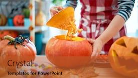  Presentation with happy holiday - Audience pleasing PPT layouts consisting of happy halloween woman is carving pumpkin family preparing for holiday backdrop and a red colored foreground