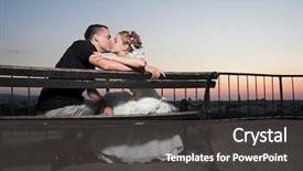  Presentation with married couple - PPT theme consisting of happy just married couple kissing outdoor at sunset wedding and marriage concept background and a dark gray colored foreground