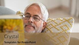  Presentation with old book - Amazing slide set having happy-mature-man-reading backdrop and a coral colored foreground