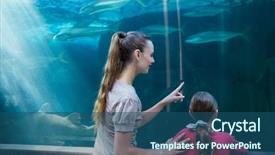  Presentation with tank - Presentation design featuring happy mother and daughter looking at tank at the aquarium background and a ocean colored foreground