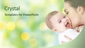  Presentation with child care - Colorful PPT theme enhanced with happy mother kissing adorable baby backdrop and a soft green colored foreground