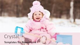  Presentation with baby toy - Theme featuring happy one year old baby girl with a toy spade outdoor on a winter day background and a lemonade colored foreground