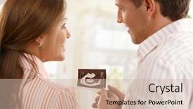  Presentation with baby ultrasound - Beautiful presentation design featuring happy parents holding baby's backdrop and a soft green colored foreground