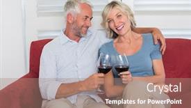  Presentation with toasting - PPT theme having happy relaxed mature couple toasting wine glasses in the living room at home background and a coral colored foreground