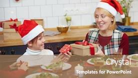  Presentation with christmas dinner - Audience pleasing theme consisting of happy senior female and her grandsone exchanging by giftboxes by christmas dinner backdrop and a coral colored foreground