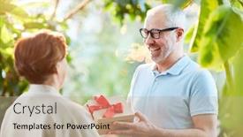  Presentation with wedding anniversary - Cool new presentation design with happy senior man giving his wife box with present for their wedding anniversary during promenade in the garden backdrop and a coral colored foreground