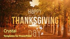 Presentation with happy thanksgiving - PPT theme featuring happy thanksgiving against autumn scene background and a tawny brown colored foreground