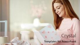  Presentation with greetings - Presentation enhanced with happy woman reading greetings in handmade card on mother day background and a coral colored foreground