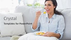  Presentation with salad - Theme enhanced with happy woman sitting on the sofa eating fruit salad in her living room background and a light gray colored foreground