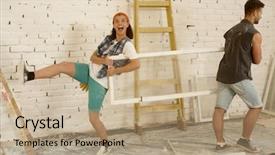  Presentation with home window frame - Cool new PPT layouts with happy young couple having fun at home renovation holding window frame backdrop and a coral colored foreground