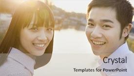  Presentation with young happy couple - Amazing PPT theme having happy young couple looking at the camera by a river backdrop and a soft green colored foreground