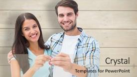  Presentation with bleached - Presentation enhanced with happy young couple showing new house key against bleached wooden planks background background and a soft green colored foreground