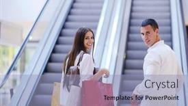  Presentation with young happy couple - Amazing PPT theme having happy-young-couple-with-bags backdrop and a light blue colored foreground