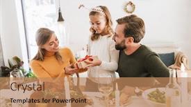  Presentation with christmas dinner - Presentation theme featuring happy-young-family-celebrating-christmas background and a coral colored foreground