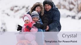  Presentation with falling snow - PPT theme having happy young family portrait on winter vacation while sitting sledge at landscape with fresh falling snow background and a lemonade colored foreground