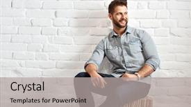 Presentation with white brick wall - Audience pleasing presentation consisting of happy young goodlooking caucasian man sitting at white brick wall plenty of copyspace backdrop and a light gray colored foreground