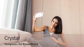  Presentation with pregnant woman - Audience pleasing presentation theme consisting of happy young pregnant woman sitting backdrop and a coral colored foreground