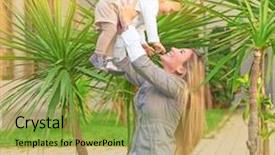  Presentation with love mother - Cool new presentation theme with happy young woman with pleasure playing outdoors with her cute little blond daughter mother lifting up baby girl having fun in the garden in sunny day love and enjoyment concept backdrop and a yellow colored foreground