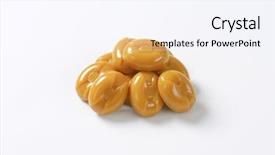  Presentation with peppermint candy cane on white - Presentation theme having hard toffee - handful of caramel candies background and a  colored foreground