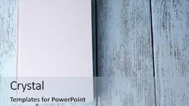  Presentation with book - Slides consisting of hardcover - white book on wooden table background and a light blue colored foreground