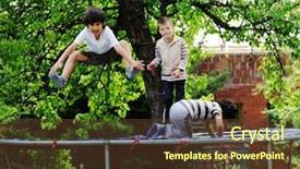  Presentation with kids jumping and lifting hand - Cool new theme with having fun jumping on trampoline backdrop and a tawny brown colored foreground