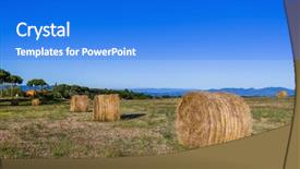  Presentation with hay field - Colorful presentation theme enhanced with hay bales on a field backdrop and a cobalt blue colored foreground