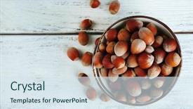  Presentation with bowl - PPT theme featuring hazelnuts in bowl on wooden background and a sky blue colored foreground