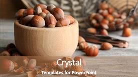  Presentation with hazelnuts - Presentation with hazelnuts in wooden bowl on wooden background background and a coral colored foreground