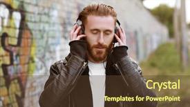  Presentation with music headphones - Audience pleasing PPT theme consisting of handsome man in headphones listening to music outdoors backdrop and a tawny brown colored foreground