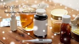  Presentation with drugs - PPT theme having healthcare medicine and treatment concept - drugs thermometer honey and cup of tea on wooden table over snow background and a lemonade colored foreground