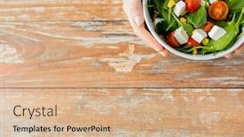  Presentation with young healthy people - Slides having healthy eating dieting and people concept - close up of young woman hands with salad bowl on blank table at home background and a coral colored foreground