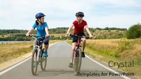  Presentation with cycling - Audience pleasing PPT layouts consisting of healthy lifestyle - teenage girl and boy cycling backdrop and a coral colored foreground