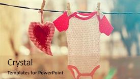  Presentation with baby clothes - Presentation theme having heart hanging on the clothesline background and a coral colored foreground
