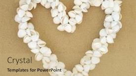  Presentation with sand heart - Cool new slide deck with heart-shaped-cockle-shell-wreath backdrop and a coral colored foreground