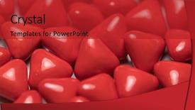  Presentation with candy heart - PPT theme consisting of heartache - closeup of red triangle pills background and a crimson colored foreground