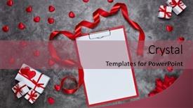  Presentation with romantic gift - PPT theme consisting of decorative red hearts gift boxes red roses satin ribbon and blank sheet of table on gray background top view valentine's day card design element for romantic greeting card wedding invitation background and a violet colored foreground