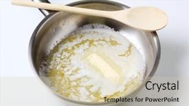  Presentation with butter - Amazing slide deck having heating butter in a saucepan backdrop and a soft green colored foreground