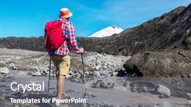  Presentation with volcanoes - Presentation theme consisting of hemisphere - man in hike in volcanoes background and a gray colored foreground