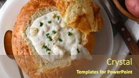  Presentation with clam - Amazing presentation design having high angle closeup of a bread bowl of new england style clam chowder on a rustic wood table backdrop and a tawny brown colored foreground