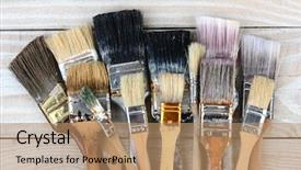  Presentation with paint high - Audience pleasing PPT theme consisting of high angle shot of a group of old used paint brushes on a rustic wooden table horizontal format backdrop and a coral colored foreground