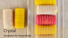  Presentation with pastries - Colorful theme enhanced with high-angle shot of a tray with some huesos de santo typical pastries of spain eaten in all saints day backdrop and a yellow colored foreground