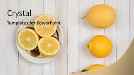  Presentation with wood rustic - Slides having high angle still life of three whole lemons and three lemon halves in a bowl on a rustic white wood kitchen table background and a soft green colored foreground