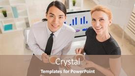  Presentation with high tea - Presentation theme with high angle view of multi-ethnic group of coworkers looking at camera with wide smiles while enjoying herbal tea at open plan office background and a coral colored foreground