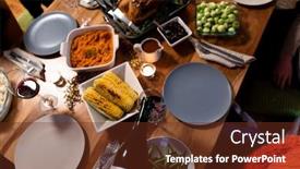  Presentation with thanksgiving dinner - Presentation design featuring high angle view of a glass of red wine being poured from a bottle at a table at home set for thanksgiving dinner background and a tawny brown colored foreground
