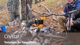  Presentation with bonfire - Presentation theme consisting of hiker-near-bonfire-in-forest background and a gray colored foreground