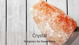  Presentation with heat - Theme consisting of himalayan salt lamp on wooden background and a soft green colored foreground